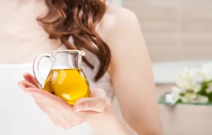 Huile de coco vs huile d'argan : laquelle choisir pour peau et cheveux ?